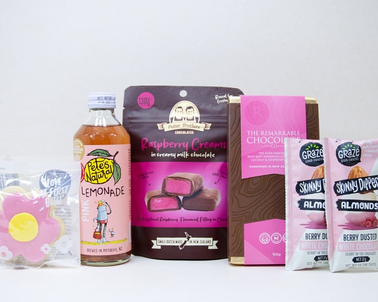 Sweet Treats Gift Box featuring Pete's Natural drink, Bennetto hazelnut chocolate, YAE collagen face mask, O'Nuts gourmet nuts, and Molly Woppy Passionfruit Cookies, beautifully packaged as an affordable gift box under $100