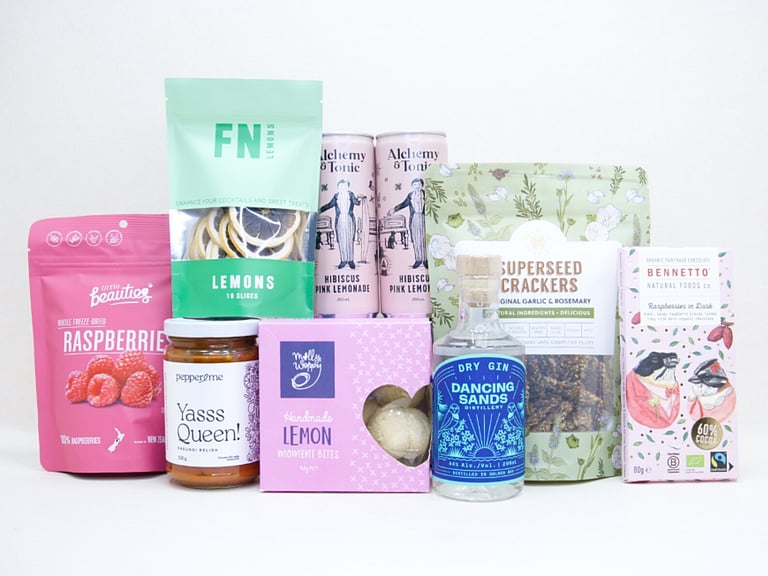 Gin O'Clock Gift Box featuring Dancing Sands Gin, Alchemy & Tonic Lemonade, Little Beauties freeze-dried raspberries, FN citrus garnishes, Kiki Seed Crackers, Pepper & Me Yasss Queen relish, Molly Woppy cookies, and Bennetto artisan chocolate, beautifully packaged for gin lovers, entertaining, and effortless gifting.