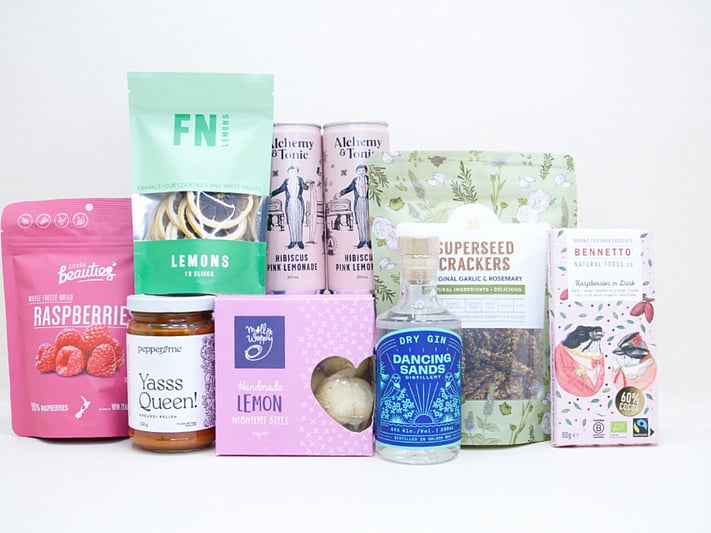 Gin O'Clock Gift Box featuring Dancing Sands Gin, Alchemy & Tonic Lemonade, Little Beauties freeze-dried raspberries, FN citrus garnishes, Kiki Seed Crackers, Pepper & Me Yasss Queen relish, Molly Woppy cookies, and Bennetto artisan chocolate, beautifully packaged for gin lovers, entertaining, and effortless gifting.