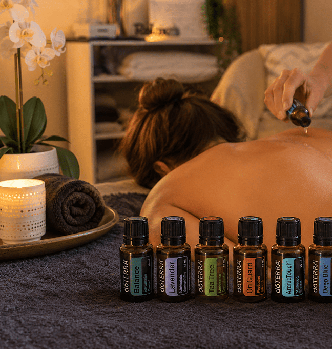  A picture of 8 doTERRA Essential oils used in the Aromatouch Technique massage