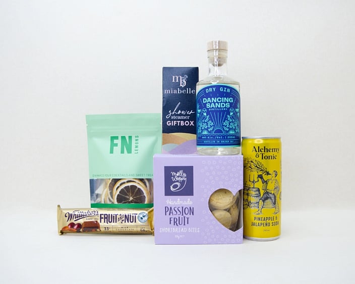 Gin Night In gift box with Dancing Sands gin, Molly Woppy cookies, Miabelle shower steamers, and FN dried lemons, thoughtfully packaged for gifting, relaxation, and gin lovers.