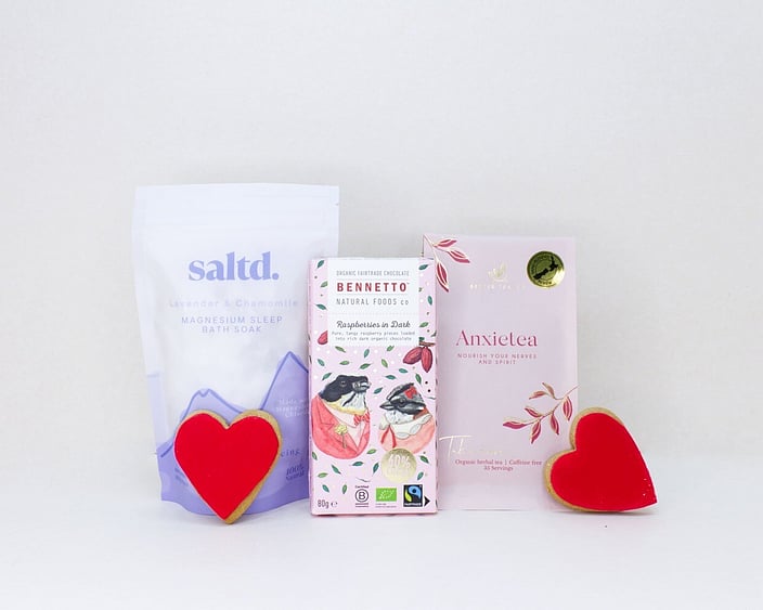 Rest & Restore self-care gift box featuring Anxietea tea, Saltd bath salts, Bennetto chocolate, and sweet treats, beautifully packaged for gifting.