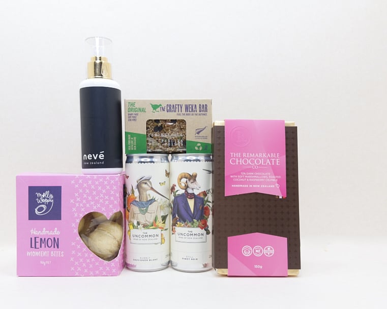 You Deserve This self-care gift box with Lemon Moment cookies, Neve room spray, Crafty Weka muesli bar, and Remarkable chocolate, thoughtfully presented in a premium gift box
