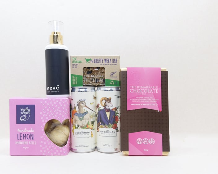 You Deserve This self-care gift box with Lemon Moment cookies, Neve room spray, Crafty Weka muesli bar, and Remarkable chocolate, thoughtfully presented in a premium gift box