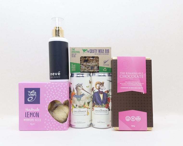 You Deserve This self-care gift box with Lemon Moment cookies, Neve room spray, Crafty Weka muesli bar, and Remarkable chocolate, thoughtfully presented in a premium gift box