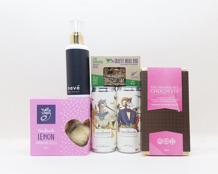 You Deserve This self-care gift box with Lemon Moment cookies, Neve room spray, Crafty Weka muesli bar, and Remarkable chocolate, thoughtfully presented in a premium gift box