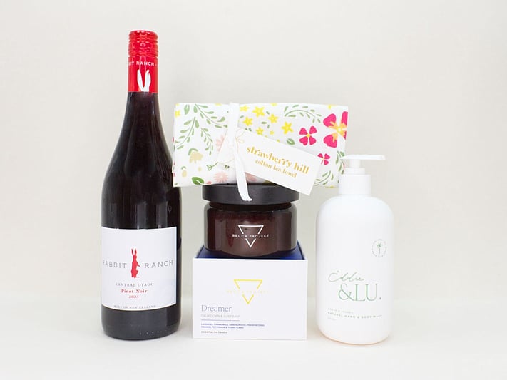 A Moment for You gift box with Strawberry Hill sparkling wine, Rabbit Ranch Pinot Noir, Becca Project chocolate and Eddi & Lu treats, beautifully presented in a premium NZ gift box.