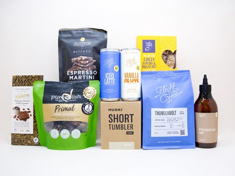 Coffee Gift Box featuring Flight Coffee, HUSKI tumbler, hazelnut syrup, coffee chocolate, and NZ-made treats.