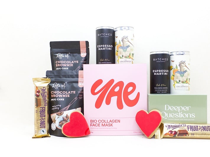 Date Night Gift Box featuring Soleiz face masks, the Deeper Questions card game, Whittaker's chocolate, and rich brownie cakes, beautifully packaged for cosy nights in, quality time together, and sharing something special
