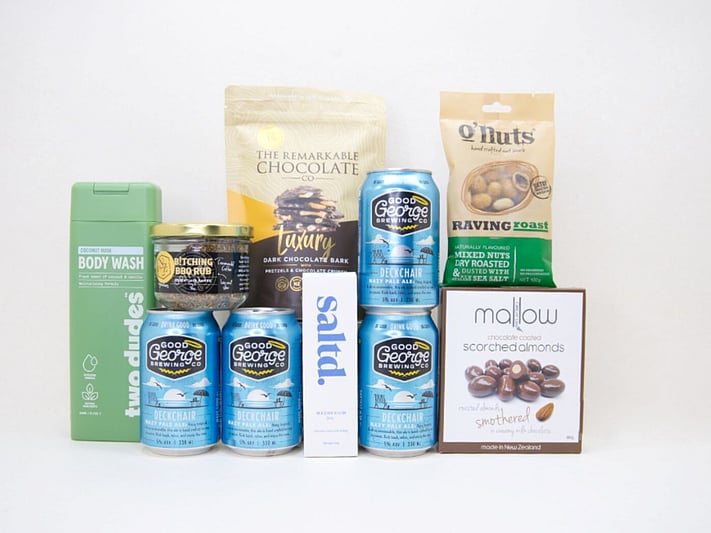 Big Beer Box featuring Good George craft beer, Two Dudes snacks, ONUTS roasted nuts, Remarkable Chocolate, Opito Bay salts, Saltd magnesium products, and premium New Zealand treats.