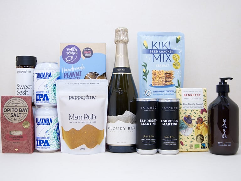 Welcome Home Gift Box with Cloudy Bay wine, espresso martinis, gourmet crackers, honey, artisan chocolate, hand wash, and New Zealand-made pantry favourites, beautifully packaged for housewarming and new home gifting.
