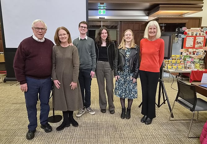 Trustees Linda Bryder and Jonathan Mason with four of the scholars.than Mason