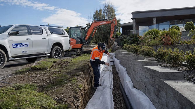 Drainpro adding drainage by retaining wall ai