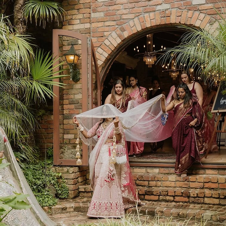 Outdoor Hindu wedding in the gardens at Settlers Country Manor