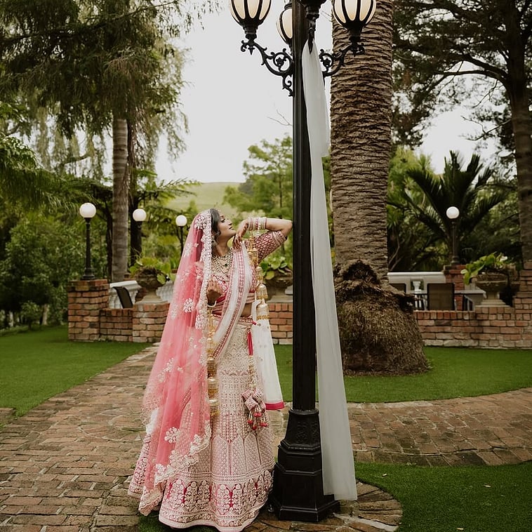 Indian bride portrait at Settlers Country Manor gardens in Auckland