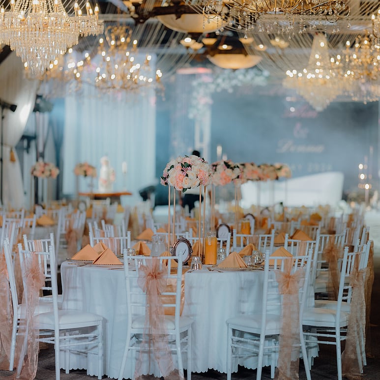 Indian wedding reception setup with round tables at Settlers Country Manor