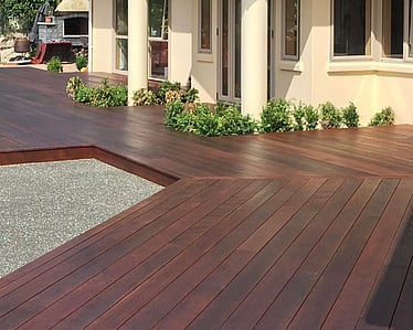 Deck connecting a Nelson home with the surrounding garden