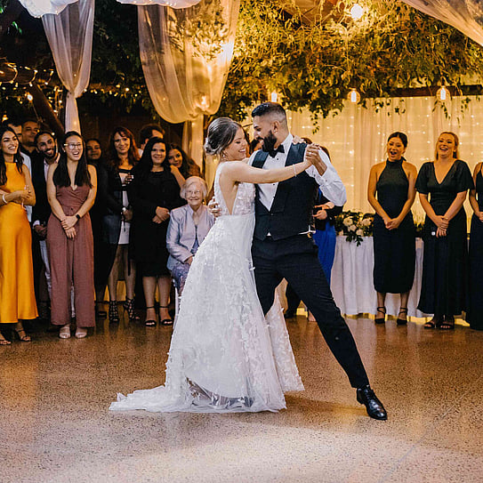 bride and groom dancing