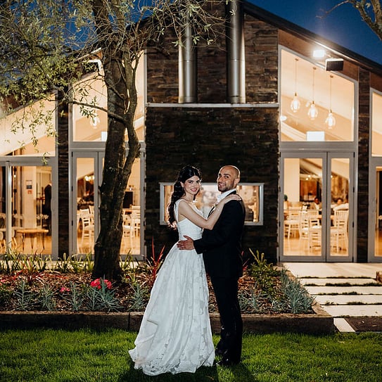couple by the fireplace