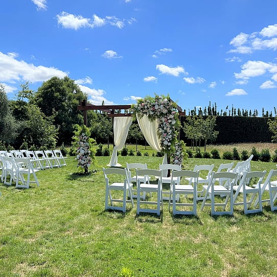 Cherry Blossom Round Wedding Ceremony with Halfmoon Seating