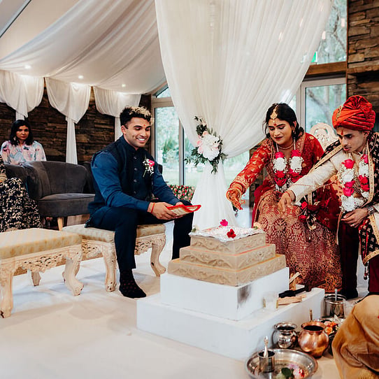 Indian Wedding Ceremony infront of Stone Fireplace