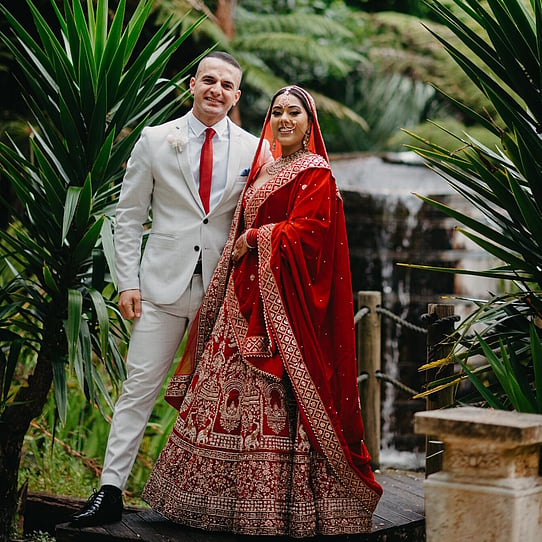 Bride and Groom infront of Barrel Waterfall