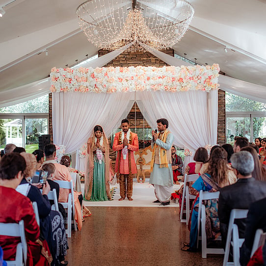 Mandap infront of Stone Fireplace