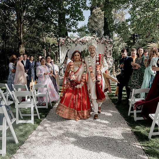 Couple infront on Mandap Outside