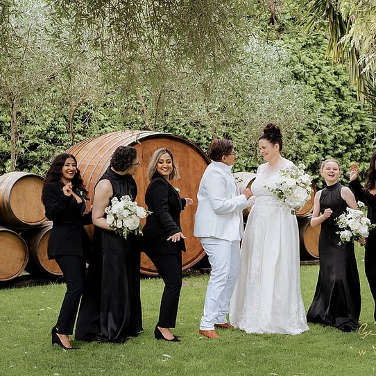 Bridal Party Photo infront of Barrel Feature