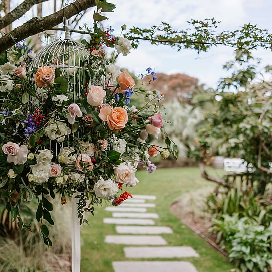 Floral Birdcage at Entrance to Pebble Beach Wedding Ceremony