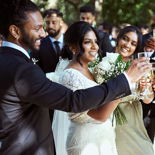 Bride and Groom with Champagne