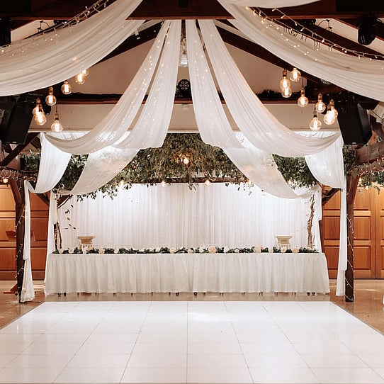 Starlit Panel Dance Floor infront of Bridal Table