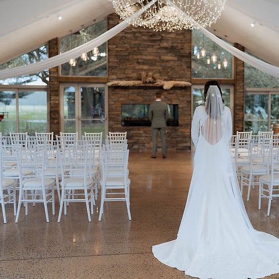 First Look Photos infront of Stone Fireplace