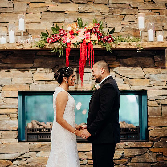 Stone Fireplace Indoor Wedding Ceremony