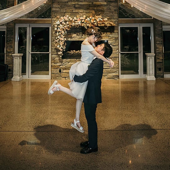 Bride & Groom First Dance infront of the Stone Fireplace