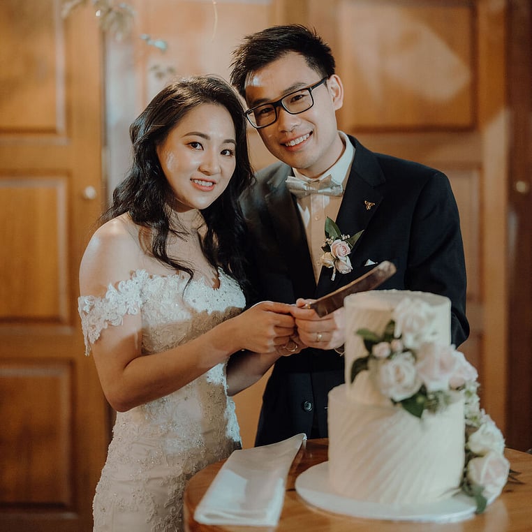 Couple Cutting Cake