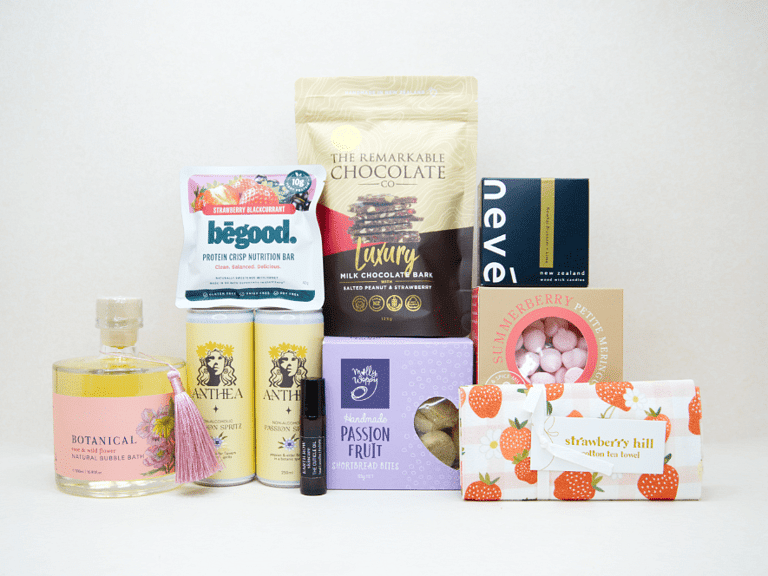 Just For Her Gift Box featuring Anthea Passionfruit Spritz, Neve candle, Botanicals bubble bath, Earthrowe cuticle oil, Strawberry Hill tea towel, Remarkable strawberry pretzel bark, Molly Woppy Passionfruit Cookies, strawberry meringues, and a Be Good protein bar, beautifully packaged for gifting, celebration, and self-care.
