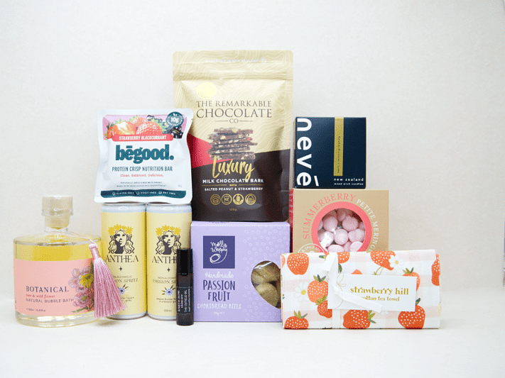 Wine & Crackers Gift Box featuring Craggy Range Sauvignon Blanc, artisan olives, Kiki Seed Crackers, Pepper & Me Hot Honey, and Remarkable Raspberry Marshmallow Chocolate, beautifully packaged for wine lovers and gourmet gifting.