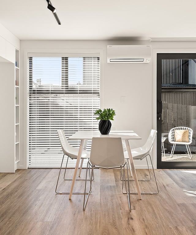 Image of a sunny light kitchen area at Highgate Ridge townhouse development by MJW Homes. Dunedin, Otago NZ