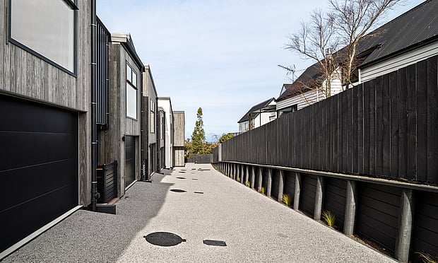Image of dark painted fencing at Highgate Ridge  townhouse in Maori Hill by MJW Homes. Dunedin, Otago NZ
