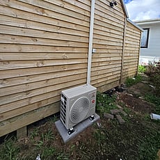 Alectrics electrician upgrading an outdoor residential switchboard in Hillcrest.