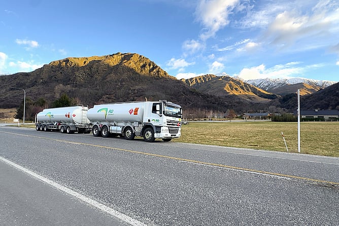 RD Petroleum B-train fuel tanker on the road near Arrowtown at golden hour, mountains in the background