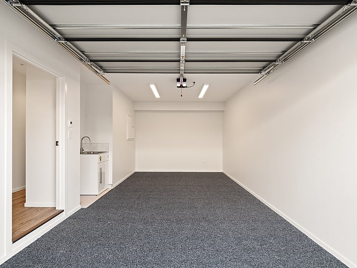 Garage and laundry of the Highgate Ridge townhouses built by MJW Homes. Dunedin, Otago.