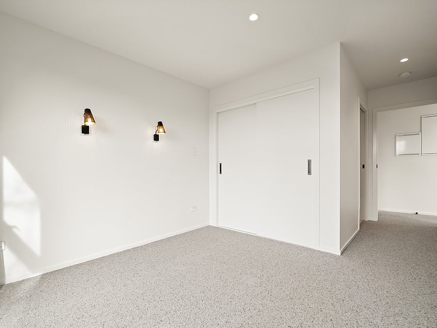 Bedroom interior image of Highgate Ridge townhouses in Maori Hill. Built by MJW Homes. Dunedin, Otago.