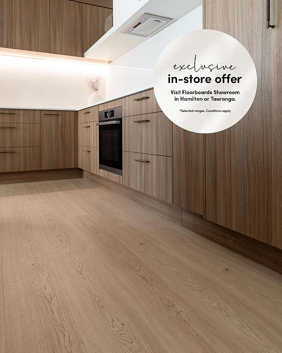 Laminate wood look floor in a bathroom.