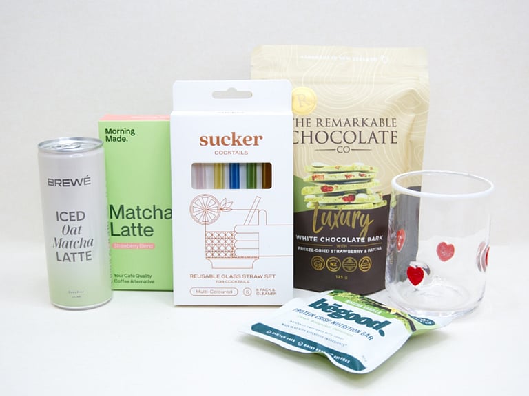 The Matcha Gift Box featuring premium matcha sachets, HomeLab glass, Sucker glass straw, Brewe Matcha Latte, Remarkables Matcha Chocolate, and Be Good Matcha Protein Crisp, thoughtfully curated for matcha lovers and wellness gifting.