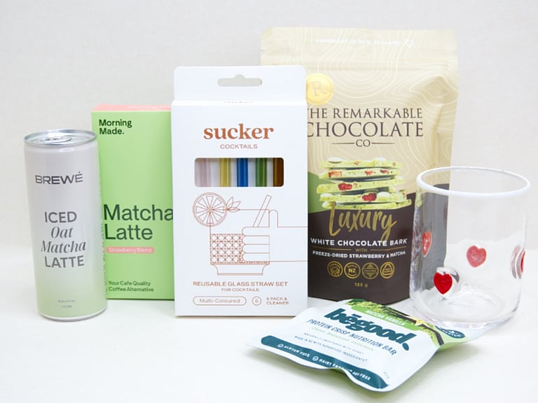 The Matcha Gift Box featuring premium matcha sachets, HomeLab glass, Sucker glass straw, Brewe Matcha Latte, Remarkables Matcha Chocolate, and Be Good Matcha Protein Crisp, thoughtfully curated for matcha lovers and wellness gifting.