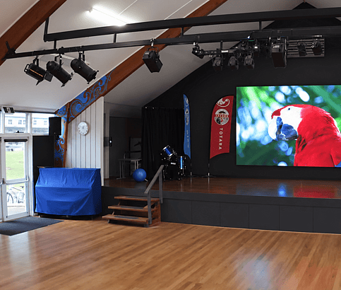 LED wall screen with large red and white bird