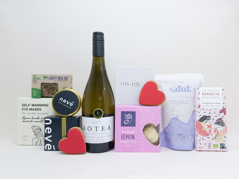 Thinking of You gift box with Aotea wine, Bennetto chocolate, Lemon Moment cookies, Neve candle, Soleiz eye mask, Saltd bath salts, and thoughtful self-care treats, beautifully presented for gifting