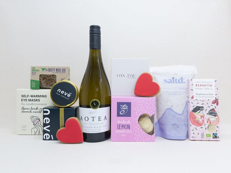 Thinking of You gift box with Aotea wine, Bennetto chocolate, Lemon Moment cookies, Neve candle, Soleiz eye mask, Saltd bath salts, and thoughtful self-care treats, beautifully presented for gifting